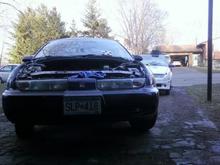 the day i put the motor back in .. donor car in the backround