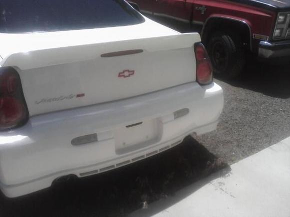 I love the red emblems on the white car.