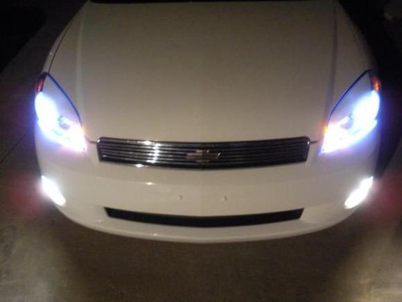 new hid kit installed and also new grill that puts the front emblem behind it