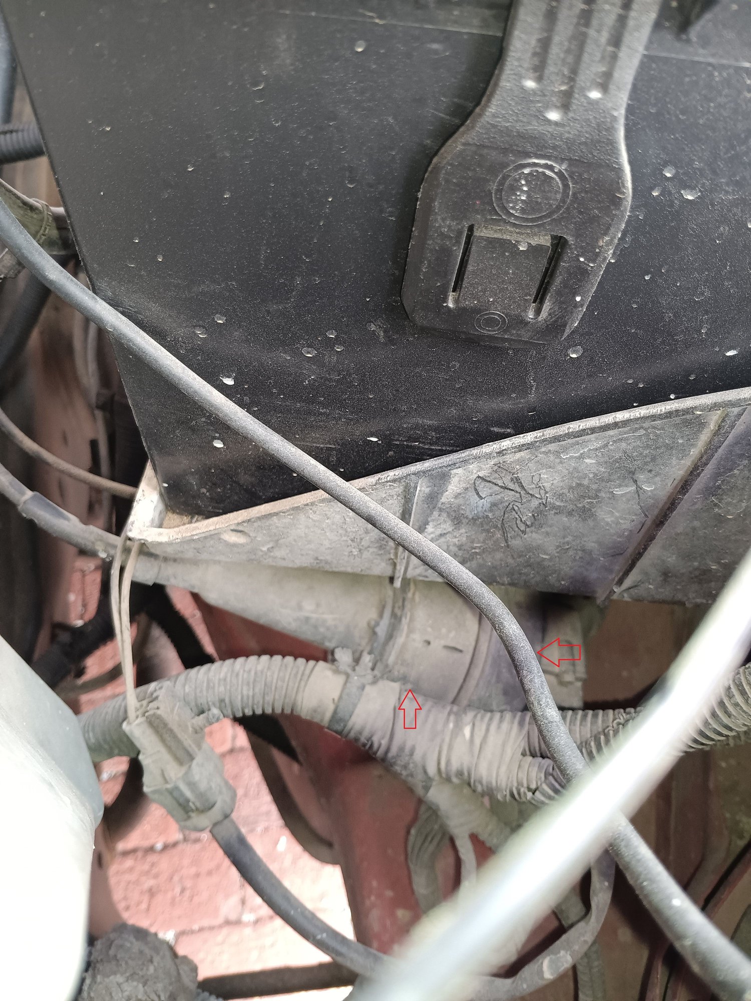 It is a roundish object under the battery box