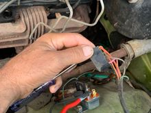 I made sure light lit up using positive post, I assumed you wanted me to disconnect the plug and test it, we did this whilst holding key in start position, the light did nothing 
I put the plug back onto the relay and same result
I stopped here because I was unsure if I should carry out the other test