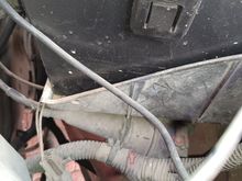 It is a roundish object under the battery box