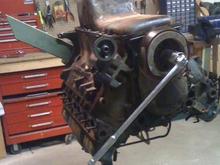 Even with the wood wedged between the flex plate and stand, still needed a snipe and a backup person on the engine stand handle