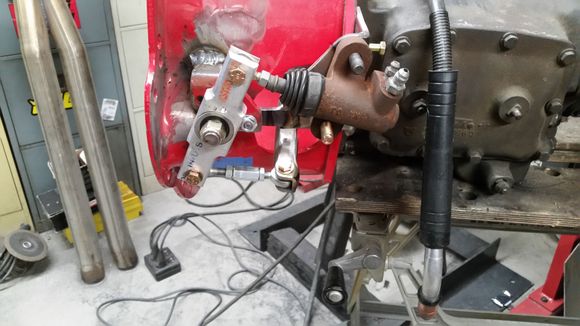 Belcrank modification needed to clear headers.