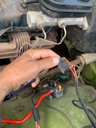 I made sure light lit up using positive post, I assumed you wanted me to disconnect the plug and test it, we did this whilst holding key in start position, the light did nothing 
I put the plug back onto the relay and same result
I stopped here because I was unsure if I should carry out the other test