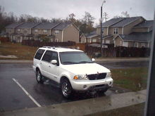 2000 Lincoln Navigator.  It was a sweet ride with the 20's and all lol,  but definitely not a mustang.