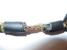 Factory splice of 8 each 16 AWG side view....no solder no galvinic corrosion as there are no unlike metals
