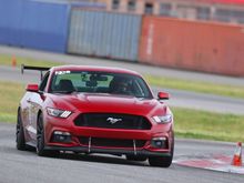 slow speed corner, missed the apex slightly.  Still to much front roll.