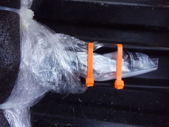 OEM bolts for shipping are inside of upright.