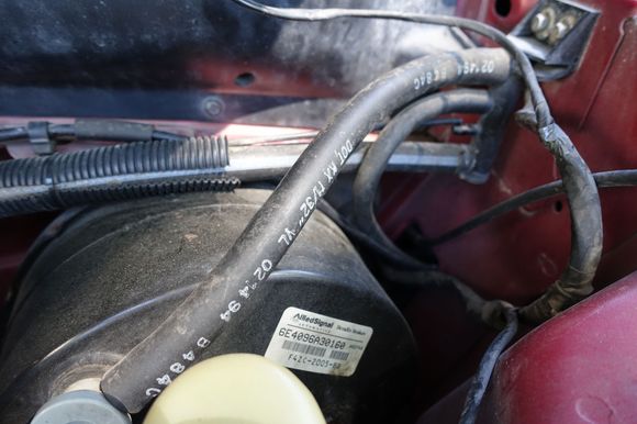 Heres the location its on the right side of the pic. The hose leads to the interior.
