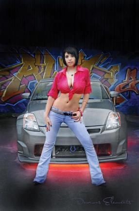 Phoenix Beauty ...aka one of the Raven Twins at Howl-O-Scream... posing with the Z...for Street &amp; Tuner Milestones