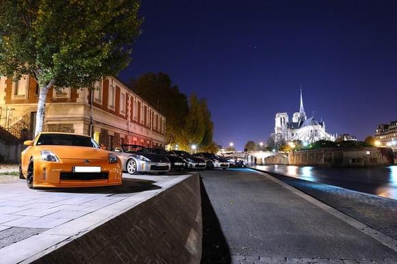 Meeting in Paris near the Seine river with &quot; Notre Dame &quot; surch behind.