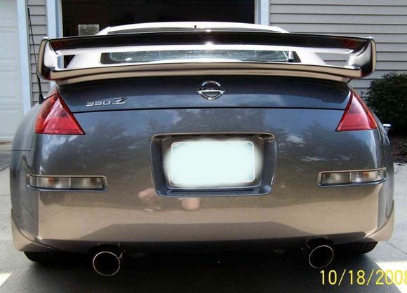 Unfortunately - the wing sits right in the middle of your field of view out the back window.