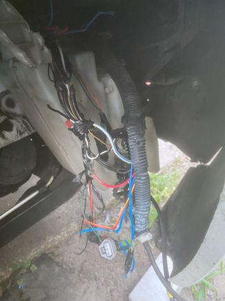 This is electrical damage in passenger front wheel bay coming from fuse box. Single dad who can’t really afford a new car but needs to get to work 
2004 Nissan quest