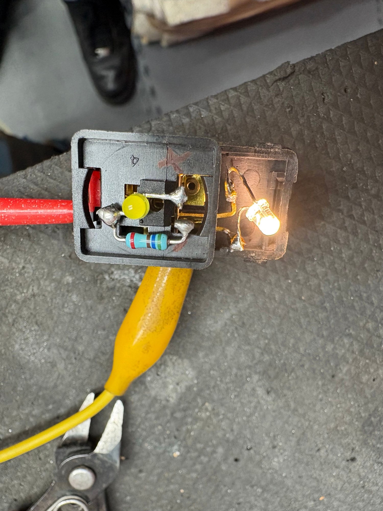 On my last drive before hibernation I noticed the  heater rear window switch was not illuminating when the lights were on so got a led to sort it. 