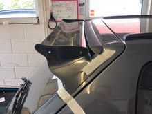 Trial fitted the carbon roof spoiler to my grey gti, it will go higher when I remove the little spoiler, obviously this would be for the red car.  I have a big t16 spoiler on the way to compare.