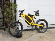 A few people on pistonheads have been asking about my Bomber 72v Electric Bike so I thought I would post it up here too.  50mph, 4.5kw so around 10hp (think) and 50 mile range on one charge. 9 speed sequential gearbox in the hub for the pedals. wheelies are easy