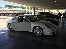 My wife took delivery today.  

A car to make the whole family involved in Porsches.


