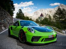 At Stelvio Pass.  I’m not digging the green stripe on wheels and wouldn’t order again in retrospect; otherwise this car is awesome.  I was nervous getting rid of my 991.1 RS for this one, but after a week in the Alps and 2 days at Spa I am thrilled. Anyone upgrading at MSRP will be very happy. 

