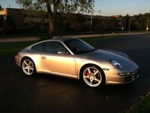 First one.  997 was a great car but the 991 is much better.  Miss it though. 