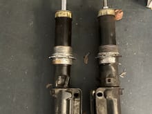 The left os from an RSA that was set at US spec height and the right is a 993 TT shock also set at US height. As you can see the collars are only threaded so low. In both cases there is limited threads to go lower. The collars unlike that used on the RS struts is not removable.
