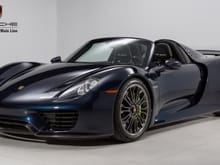 2015 Porsche 918 Spyder with only 817 miles. at the time $1.5M