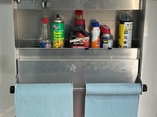 Cabinet for fluids and a mini[work space