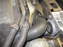 There are several hoses that run under the car and over the transmission space, where it need to drop.  Mark them for future reference.
