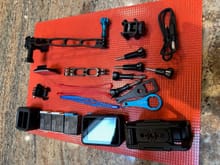 Assort of mounting clips, screws, wrenches, arms
