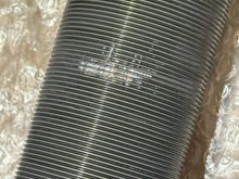 Cosmetic damage only—threads are intact and can be smoothly adjusted with the perch.