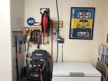 Compressor, some Snap-On tools, and 1 hose reel.