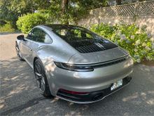 Exclusive design (white) tail lights, debadged model designation