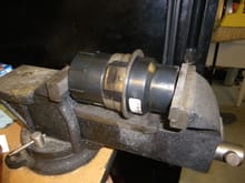 Pressing in the bearing using a vise
