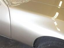 In some light it's GOLD... in some light it's PLATINUM... in a dark garage it looks like a tan minivan color...  LOL!!!