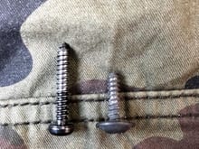 The radio screw is on the left.
The screw on the right has the same threads but is for the dash and is pictured below to the left of the seat heater control.