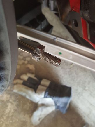 This nut stripped all its threads, and then couldn't be removed.  I ended up cutting it off with a Dremel tool.