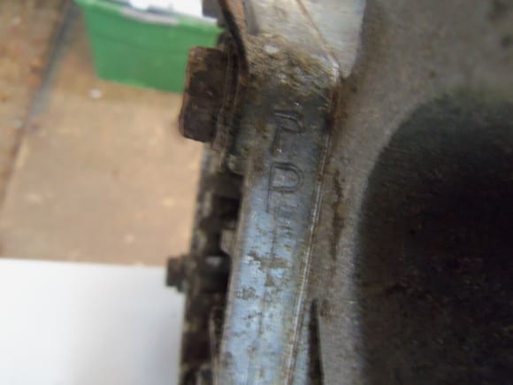 'P' stamping added to right side bearing cap.