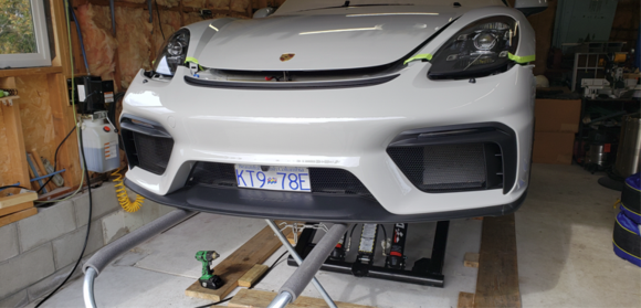 Front bumper showing body shop style fender support, cover just released