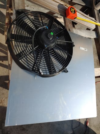16 Proform Fan 2100 CFM, this fan barelt fits and is larger than the radiator itself. So I am making a poor man's fan shroud out of aluminum sheet metal. This when finished will bolt up to the factory radiator fan mounts.