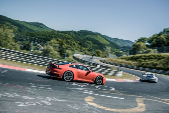 its fast and handles well but it is not as agile as a GT car ... and the engine just isn't as memorable as the 4.0L ... 

(that's me following the instructor GT3 thru wehrseifen)