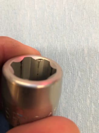 Scar in socket where the lug nut wedged.