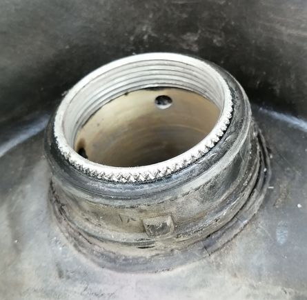 Insert as it sat after removal of in-tank pump. Drifted it back into correct location.