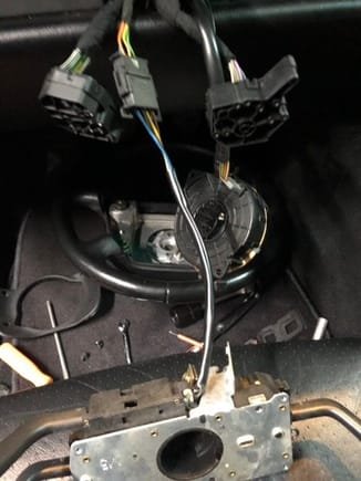 The middle connector gets pushed back into the dashboard. The two outside connectors attach to the switch body.  They also pull directly off. Just a snug fit.
