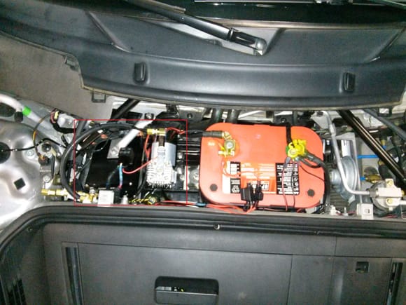I originally went to this battery because it was smaller with similar specs to OEM and needed space to mount the separate air compressor and control box for my cargraphic AirLift noselift system.  Frunk looks stock with all covers installed.