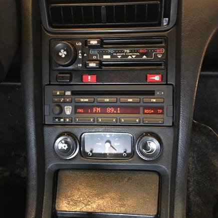Blaupunkt CD43 (BMW/Rover) This is probably the best looking of all of them. Digital tuner and does BT streaming via an accessory. Very easy to use and the big buttons are easy to find while driving. Fits perfectly. This is a very nice option. 