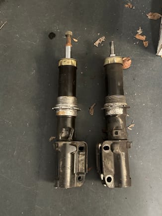 The left os from an RSA that was set at US spec height and the right is a 993 TT shock also set at US height. As you can see the collars are only threaded so low. In both cases there is limited threads to go lower. The collars unlike that used on the RS struts is not removable.