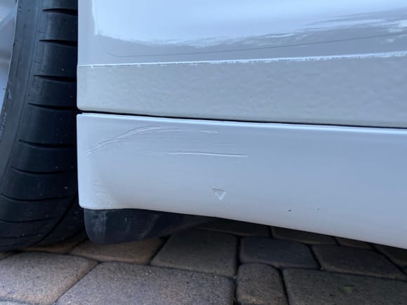Side skirt scratch, not noticeable unless you are really looking for it.