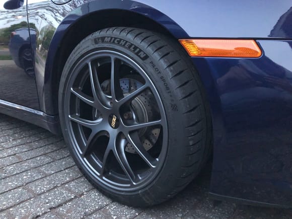 Wheel closeup showing Michelin Pilot Sport 4S tires