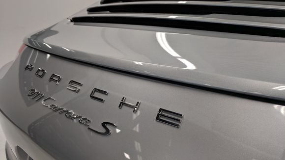 Chrome-look emblems were to be replaced with simplified matte black emblems.