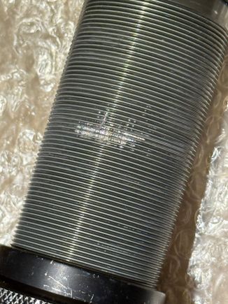 Cosmetic damage only—threads are intact and can be smoothly adjusted with the perch.